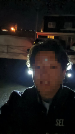 駐車場で?
